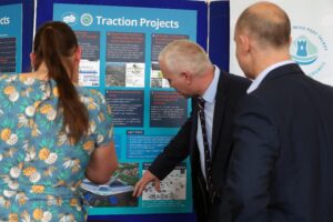 Presenting the Traction Projects to guest at the FLEXIS Demonstration Area launch